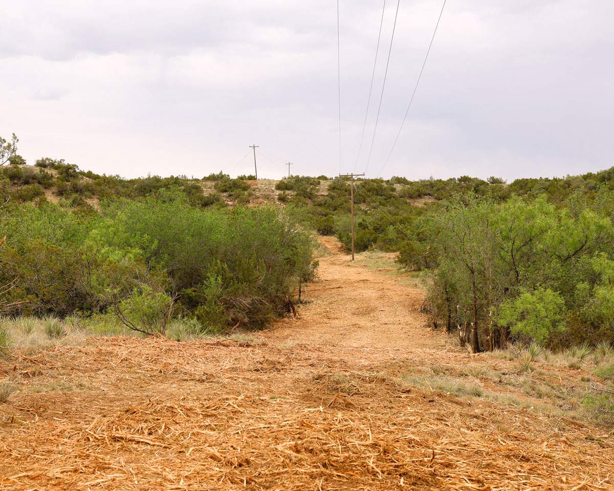 Land clearing site prep — grubbed and rough-graded for construction